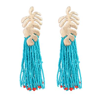 China The Other Brass Border Bohemian Retro Turquoise Beaded Tassel Earring For Women for sale