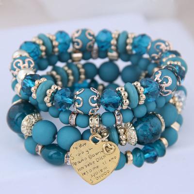 China Hot Sale BOHEMIA Beads Elastic Bohemian Bracelets Charm Fashion Heart Pendant Multi Circle Beaded Bracelets for sale