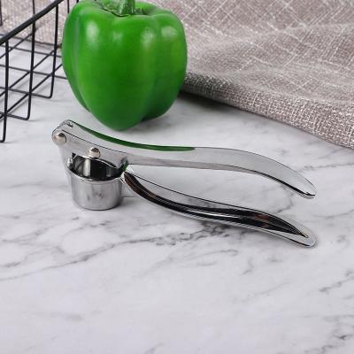 China Kitchen Viable Multifunctional Zinc Alloy Tool Handheld Garlic Press Garlic Grinder 150G Meat Grinder for sale