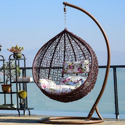 China Modern Wholesale Basket Steel Wicker Rattan Swing Seat Furniture Outdoor Patio Swing Chair Hanging Garden Swing Egg Chair With Stand for sale