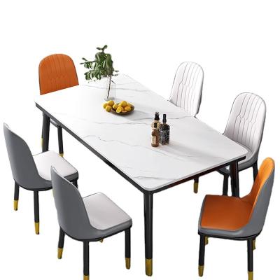 China Easy clean Morden Luxury design 6 seats Christmas wedding luxury leather marble sintered stone dining room furniture table and chairs set for sale