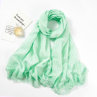 China Muslim Multicolor Feeling Soft Smooth Elegent Lace Scarf Women Malaysia Hijab Scarf Shawl Lace Up Women Tudung Snap Hijab Scarf for sale