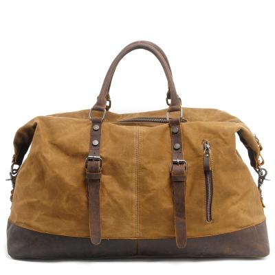 China TIDING Cowhide Leather Travel Duffel Bag Waxed Canvas Men's Balance Luggage Weekender Waterproof Durable Carry On Bag for sale