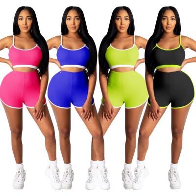 China Fashion Hot Selling QUICK DRY Summer Logo Short Casual Shorts Sports Solid Color Ladies Solid Color Yoga Camisole Custom Stitching Two Piece Suit for sale