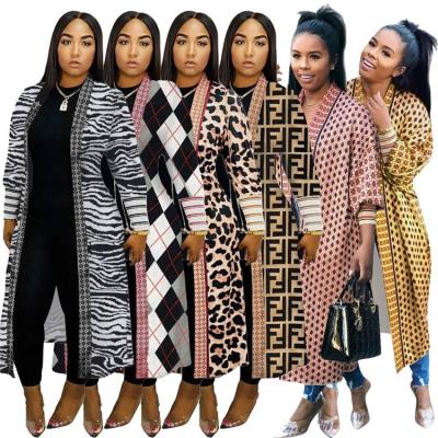 China Anti-wrinkle Autumn 2021 best-selling fashion wholesale winter fashionable warm sheath long print tops long knitted coat women tops for sale