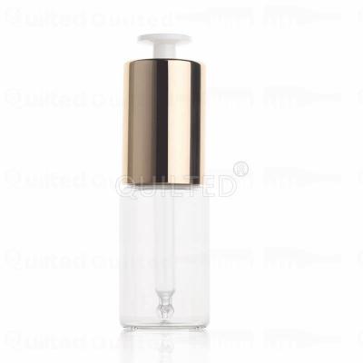 China Personal Care Essential Oil Bottle 15ml 30ml 50ml Round Thick Transparent Glass Bottle With Silver And Gold Dropper for sale