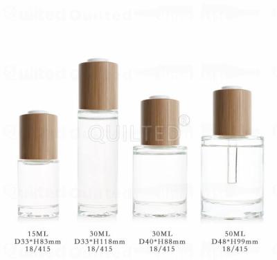 China New Design Personal Care Push Button Shoulder 30ml Flat Essential Oil Bottle Frosted Cosmetic Bamboo Dropper for sale