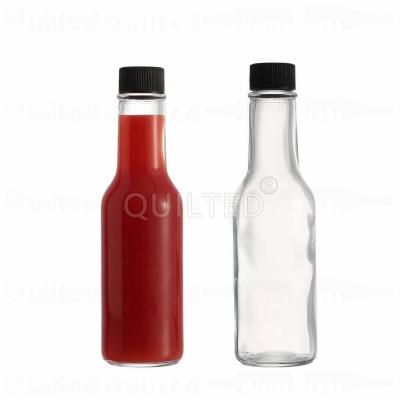 China Cheap Empty Dim Beverage 3oz 5oz 8oz 12oz 16oz Spice Dressing Table Glass Salad Hot Chili Sauce Bottle With Black Leakproof Cap for sale