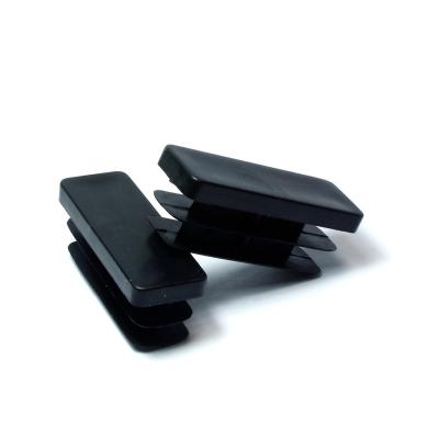 China Rectangle Plastic Custom Black Plastic Inject Molding Tube Hole Plug Cover for sale