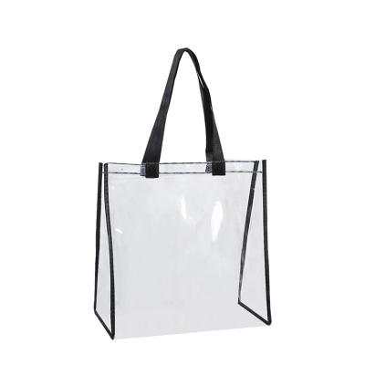 China Daily Used Transparent Black Waterproof Shopping Travel Sports Student Packing Gifts Canvas Handle Clear Portable Bag for sale