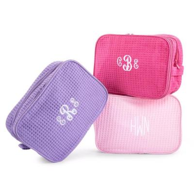 China Fashion Monogram Waffle Weave Cosmetic Bag for sale