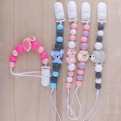 China BPA Free Baby Pacifier Chain Bear Decor Silicone Pacifier Clip Milk Teeth Chain Clip for sale