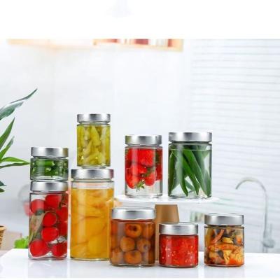 China Wholesale Food Storage Kimchi Food Cans 200ml 500ml Round Food Bottle Honey Metal Cap Glass Bottle for sale