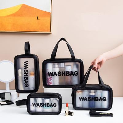 China Fashion Amiqi Logo Printed Custom Wholesale Make and Wash Bag with Large Capacity Portable Cosmetic Bag for sale