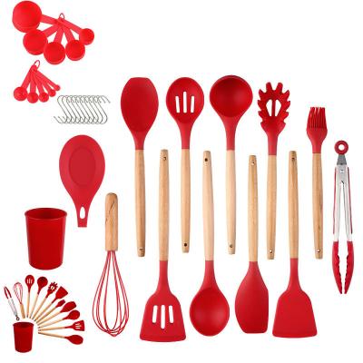 Chine Ensembles de ustensiles de cuisine en silicone avec poignée en bois résistant à la chaleur pour OEM/ODM à vendre