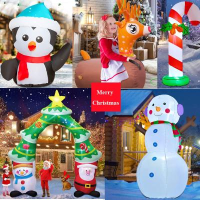 China Indoor Outdoor Garden Christmas Decorations 6ft Natal Inflatables Santa Claus With LED Lights Green for sale