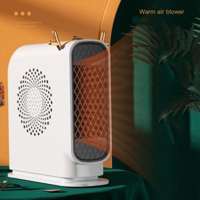 China Portable Electric 2023 Space Heater Fan Mini Electric Heaters 0.65kg for Car Heating for sale