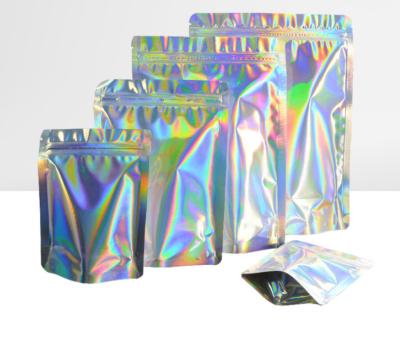 China Phone case 2020hot sale custom logo zipper holographic cosmetic packaging bags/holographic pouches for food packaging for sale