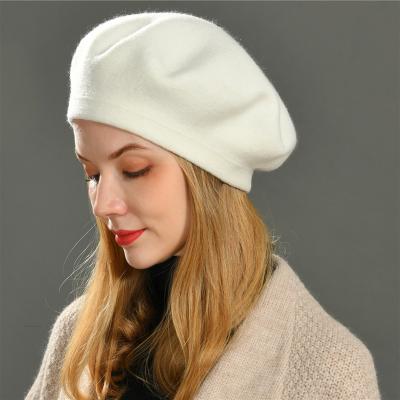 China Stylish British Pom Pom Hats Winter Women Beret Solid Color Fashion Fur Hat Casual Spring Beret True Hat for sale