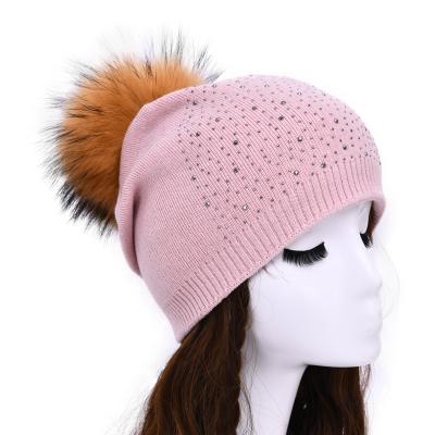 China COMMON Wool Knitted Black Beanie Pom Pom Hat Fashion Warm Cashmere Women Winter Real Raccoon Fur With Pom for sale