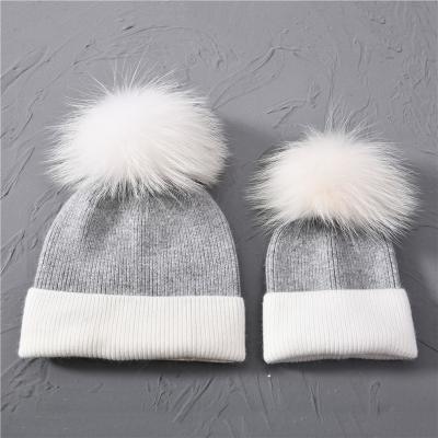 China COMMON Fashion Matching Beanie Mom and Baby Pom Pom Beanies Cashmere Knit Winter Fur Baby and Mum Beanies for sale