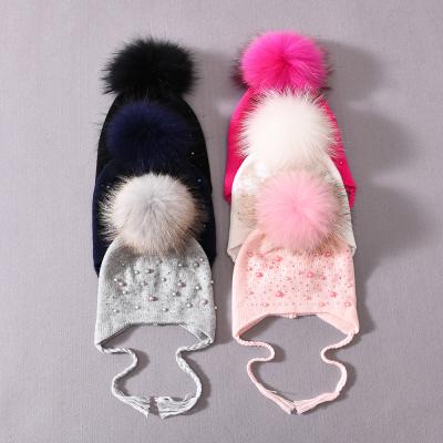 China JOINT Wholesale Thick Warm Cute Kids Pom Pom Winter Custom Cashmere Beanie Double Layer Earflap Baby Hats for sale