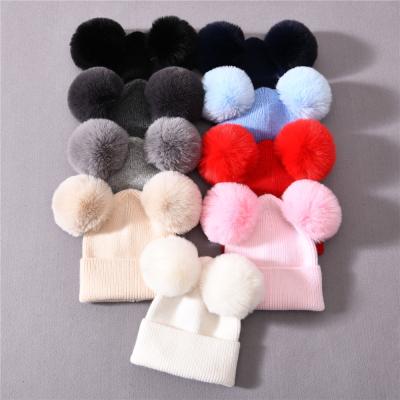 China COMMON Quality Wholesale Cashmere Knitted Baby Hat Pom Pom Winter Custom Warm Kids Cute Winter Beanie for sale