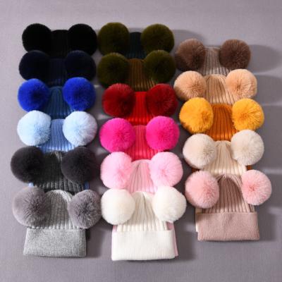 China COMMON Winter Cashmere Wool Warm Knitted Beanies Line Pom Pom Cute Baby Fur Ball Winter Knit Kids Pom Beanies for sale