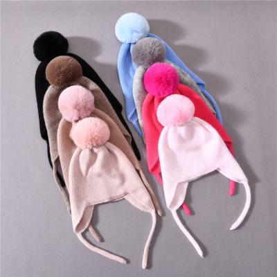 China Large Pom Pom Beanies Children Cute Earflap Winter Knitted Kids Hats Wholesale COMMON Fashion New for sale