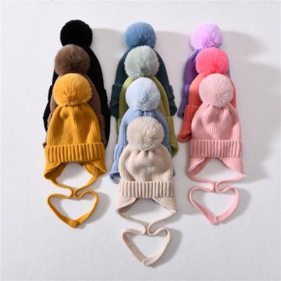 China Cute Funny Fluffy Earflap Pompom Baby Beanies Lovely COMMON Autumn Winter Warm Kids Wool Hat for sale