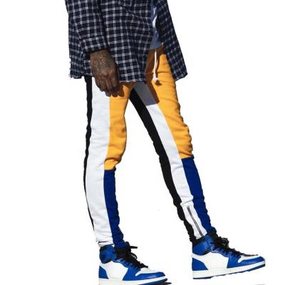 China QUICK DRY Color Block Sports Side Striped Track Jogger Pants Mens Skinny Pants With Zippered Ankle for sale