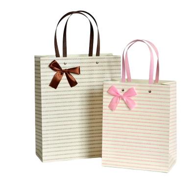 China Recyclable Wholesale Recycled Bags In Cardboard Stock Shopping Bag With High Quality Paper Bag With Rope Handle for sale