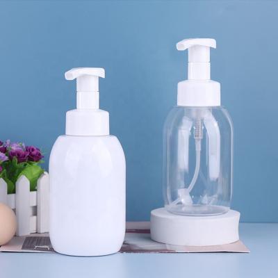 China Household Products PET White Round Plastic Bottle 300ml 500ml Hair Oil Hand Sanitizer Bottle With Lotion Pump for sale