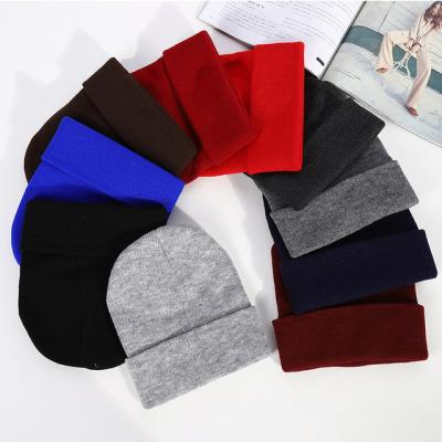 China Custom Warm Winter Striped Embroidery Logo Fashion Solid Color Beanie Knit Hat for sale