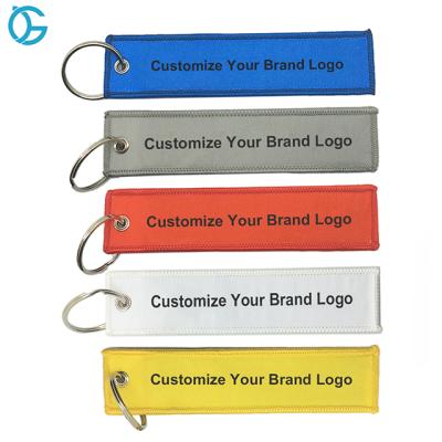 China Europe Cheap Wholesale Customized Customized Cloth Ring Woven Label Embroidery Keychain for sale