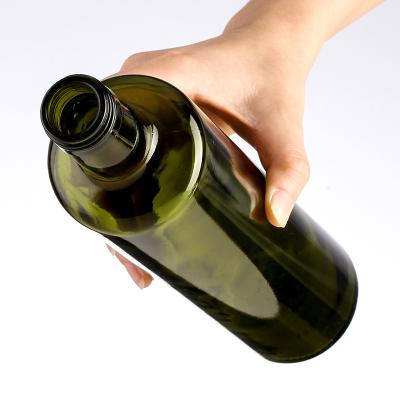 China Wholesale Dark Oil Factory Glass Olive Oil Bottle With Lid for sale