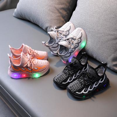 China New Flat Fashion Design Boys Girls Lighting Kids Led Sneaker Child Mesh Breathable Sport Shoes Kids Shoes For Girls for sale