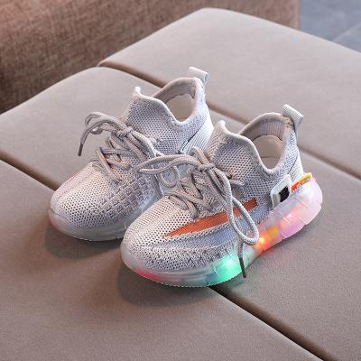 China Fashionable Flat Knit Sneakers Boys Girls Sports Shoes Lighting Children's Led Shoes Led Kid Sneakers for sale