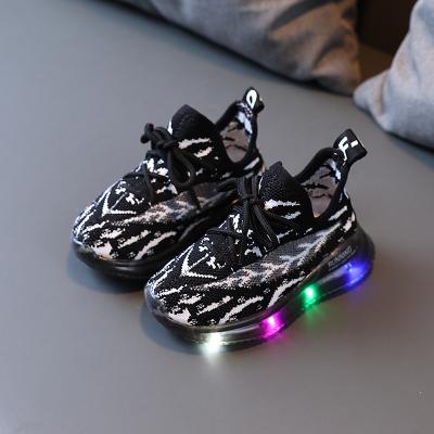 China Girls Flat Led Lighting Knitted Sports Shoes Kids Casual Sneakers Led Flashing Shoes For Kids Boy for sale