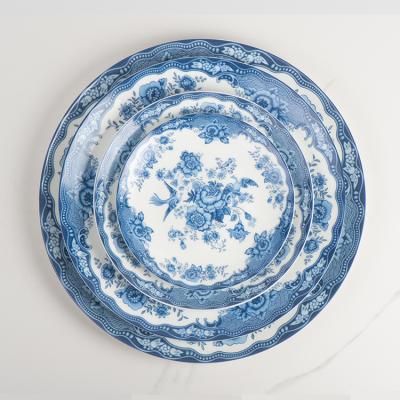 China Sustainable Antique Dinnerware Sets Fine Bone China Blue And White Dinner Plates Style Sets With Blue Rim for sale