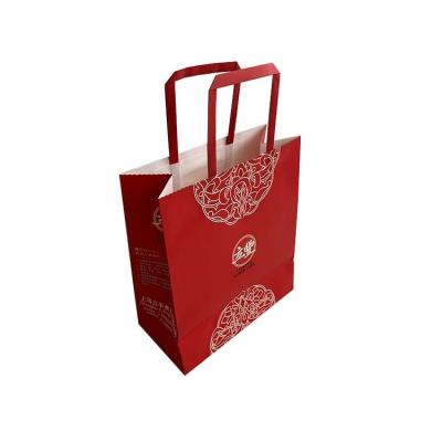 China Recycled Materials Custom Paper Clothes Packaging Bag Luxury Brown Kraft Paper Shopping Bag With Handles for sale