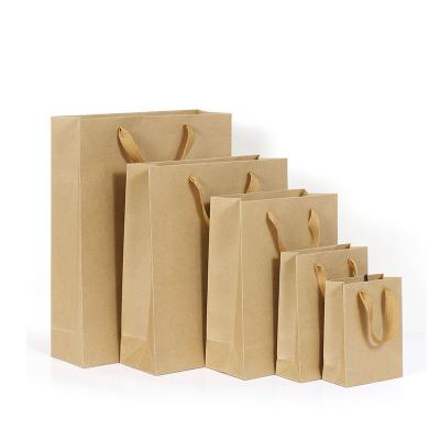 China Brown Recyclable Compostable Luxury Custom Your Own Logo Print Kraft Paper Shopping Bag With Twist Handle for sale