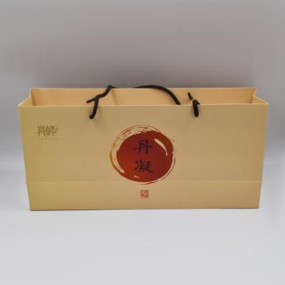 China Recycled Materials Customized Logo Size High End Material Packaging Gift Box With Handle for sale