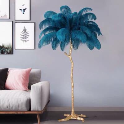 China Simple modern natural blue gold body ostrich feather floor lamp modern LED bulb bedroom and living room position lamp for sale