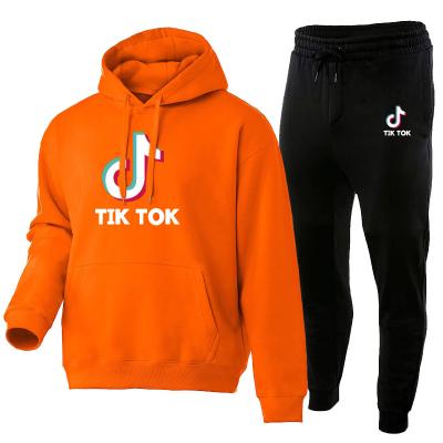 China 2021 custom black QUICK DRY hoodie full set unisex sweatpants and hoodie woman men thick 2 piece cotton tiktok hoodie set for sale