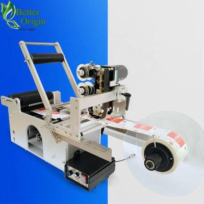 China 1-3 Lines Adjustable Semi Automatic Mini Plastic Bottle Labeling Machine Round Bottle Labeler for sale