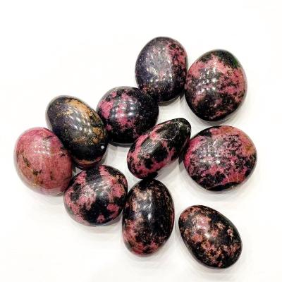 China Natural Stone Crystal Polished Rhodonite Palm Stone from Europe Palm Massage Therapy for sale