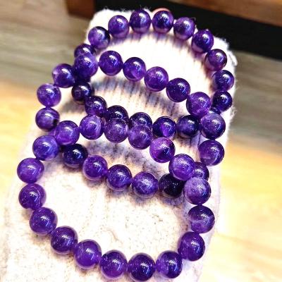 China Eco-friendly Natural Healing Reiki Amethysts Bracelet 11mm Crystal Stone Stretched Beaded Gems Bracelet For Gift for sale