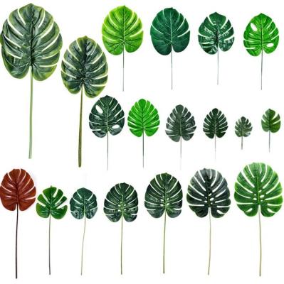 China Stage Home Decoration Wedding Decorative Monstera House Leaves Artificial Palm Leaves Mall Household Decoration for sale