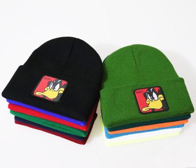 China Competitive Price Winter COMMON Hat For Men Women Wholesale DUCK Beanie Hat DAFFY Logo Custom Beanie for sale